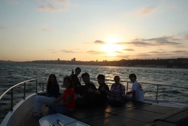 Guests watching the sunset on the Bosphorus cruise