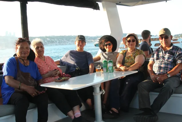 Group at the table on the Bosphorus sunset cruise yacht